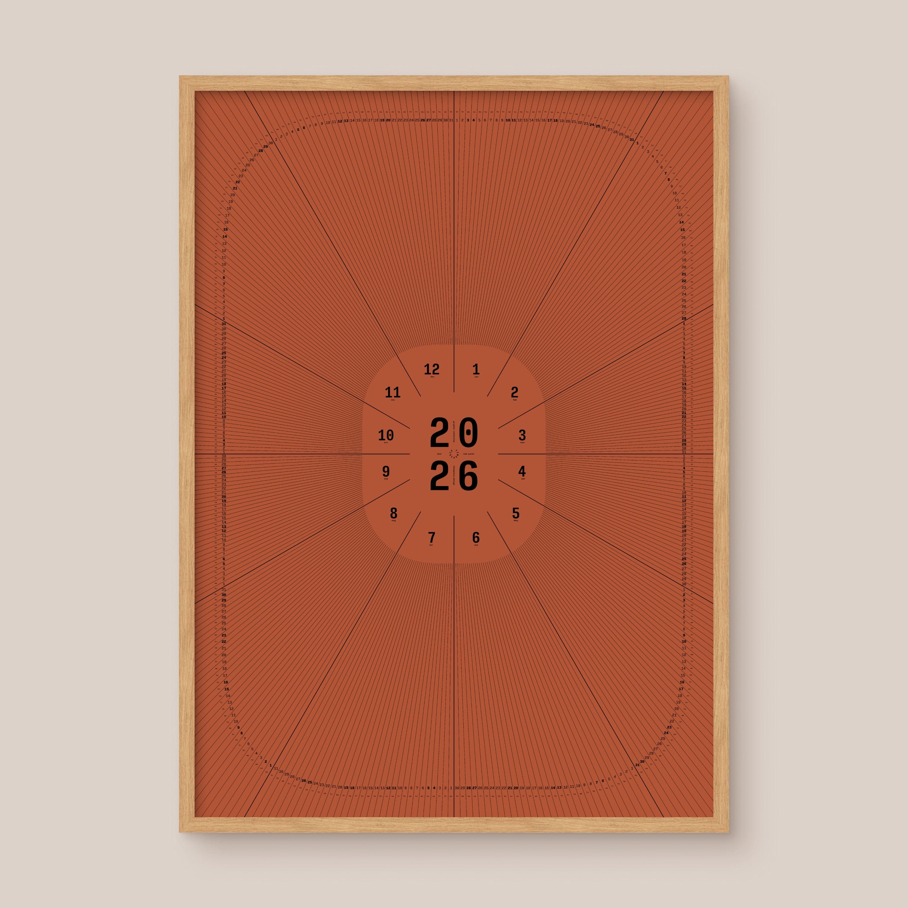Red geometric calendar with a circular design and numbers on a beige wall, natural wooden frame
