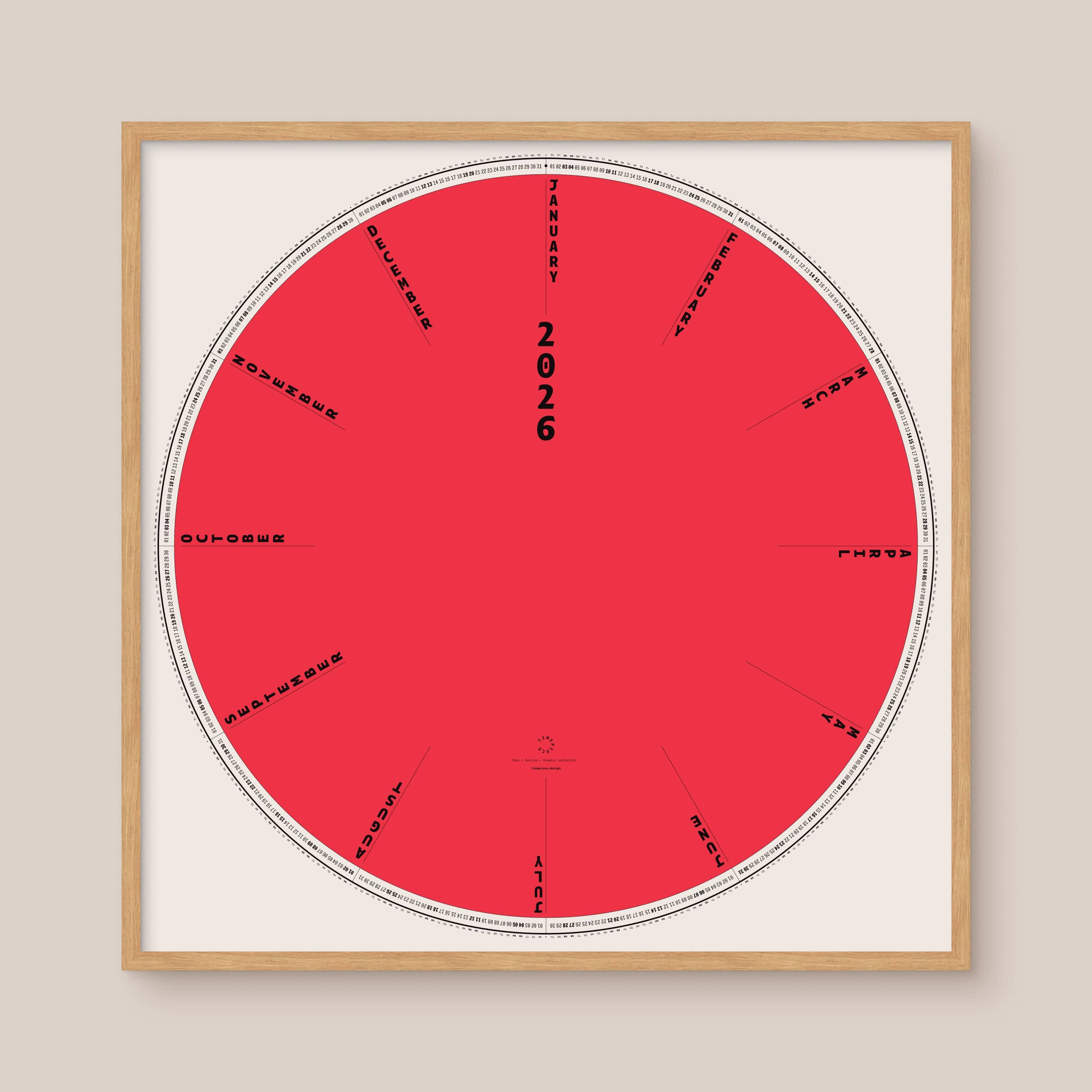 Circular red and white calendar with '2026' and text on a beige background, natural wooden frame