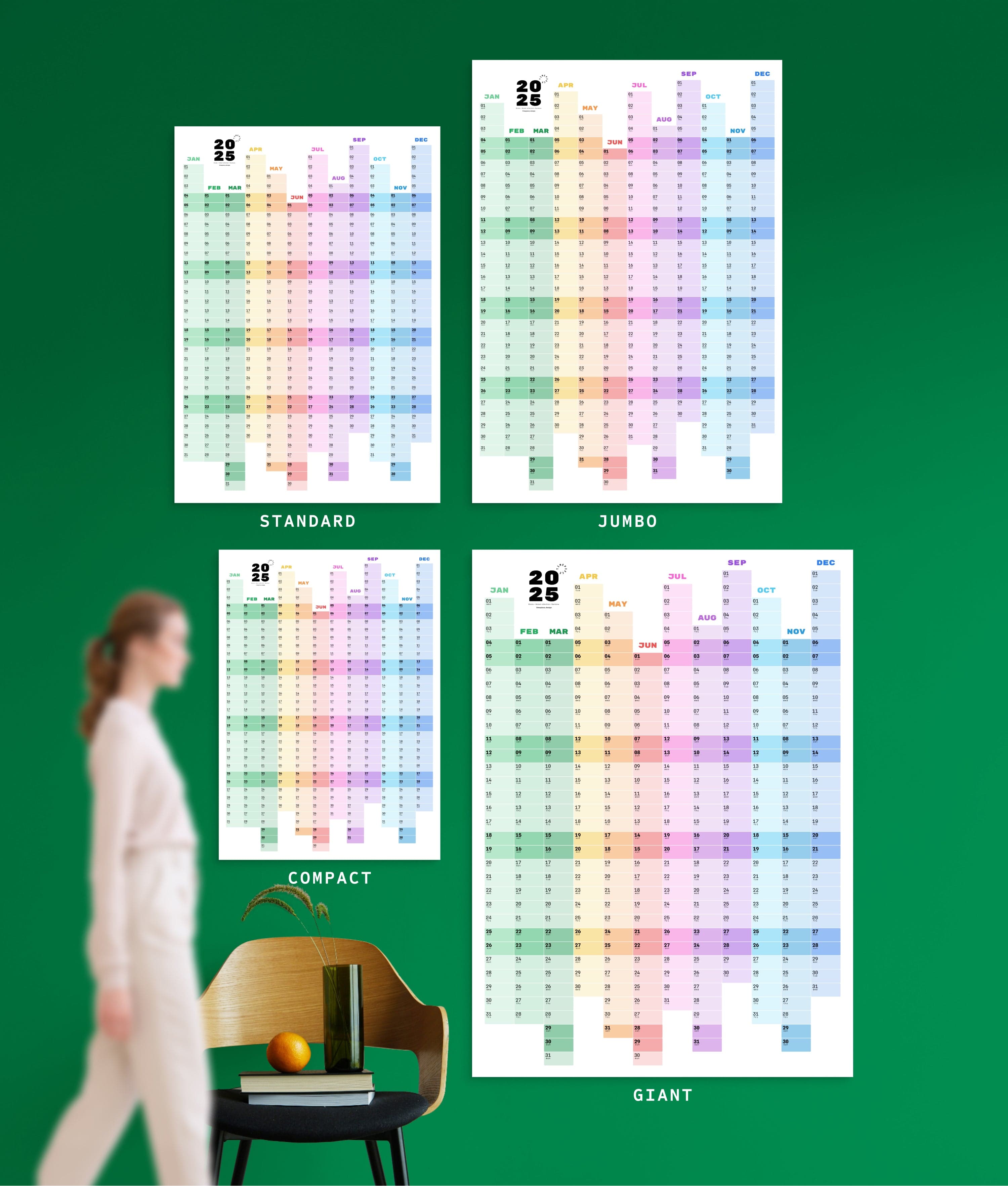 4 sizes of Noted Blocks yearly planner on green wall, with person, chair, orange and vase shown for scale